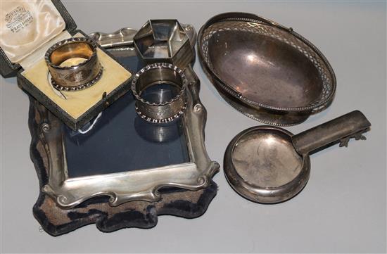 A silver basket, napkin rings, frame, etc.